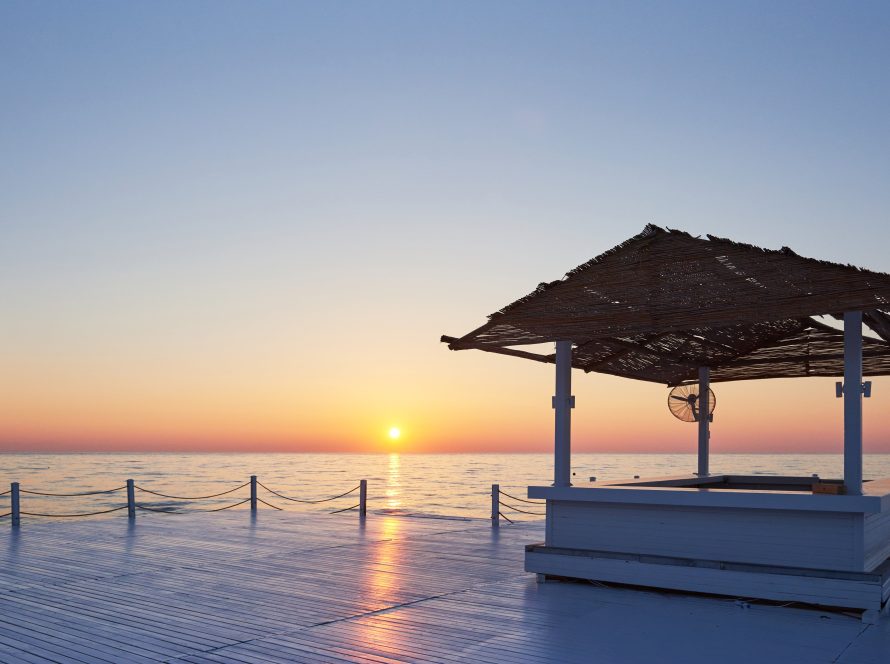 wooden bridge pier against beautiful sky min